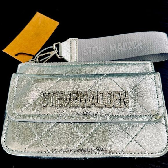 Steve Madden Haines silver, quilted wristlet. - Picture 1 of 7